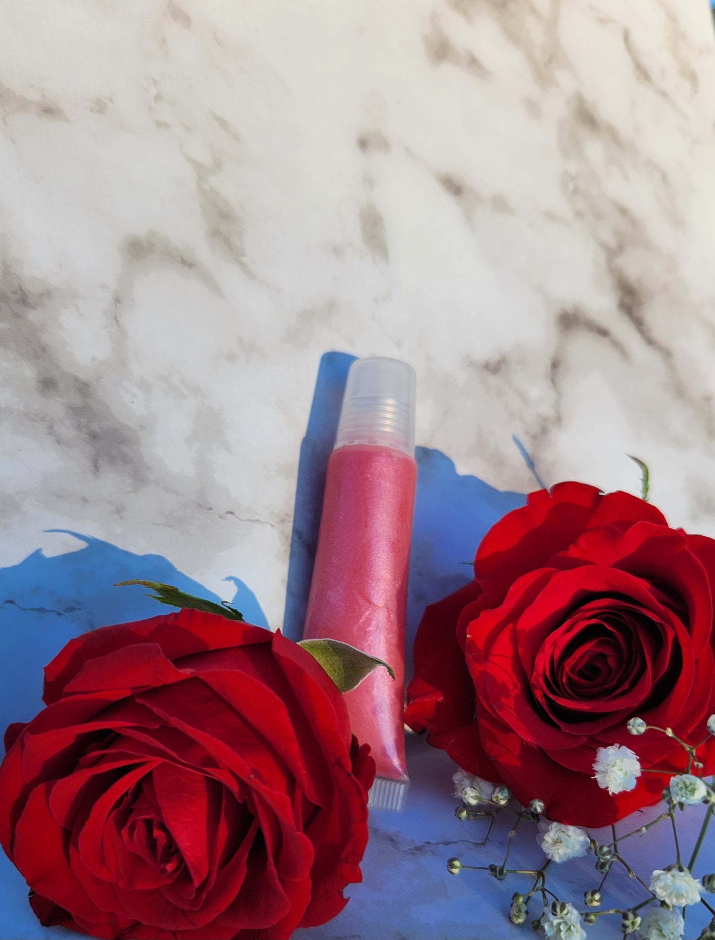 Flight lip gloss ( pretty pink lip gloss)
