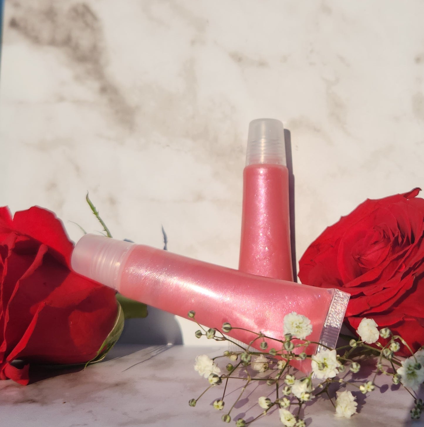 Flight lip gloss ( pretty pink lip gloss)