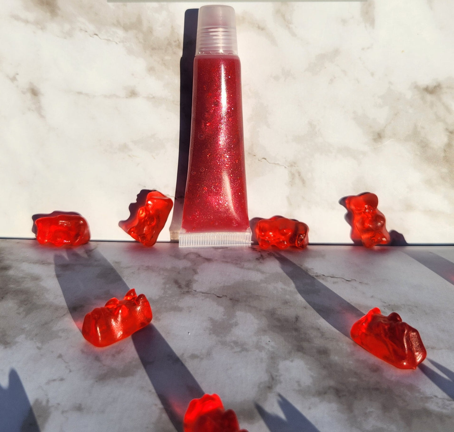 Covered (Red glitter lip gloss)