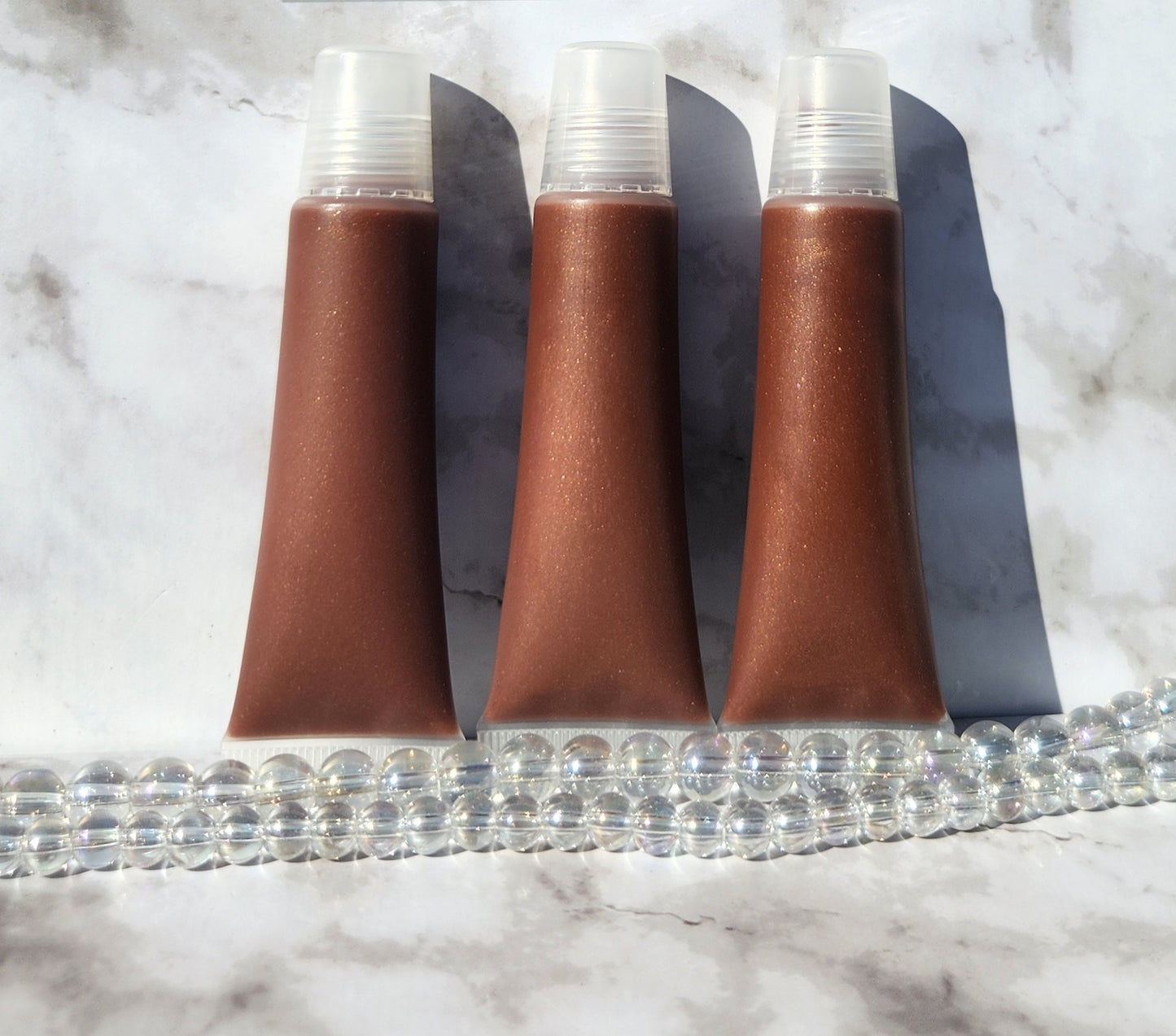 My Help lip gloss (Sheer brown lip gloss)