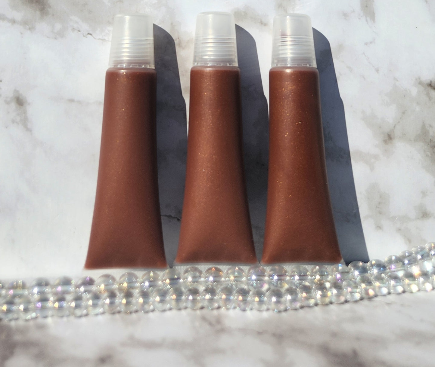 My Help lip gloss (Sheer brown lip gloss)