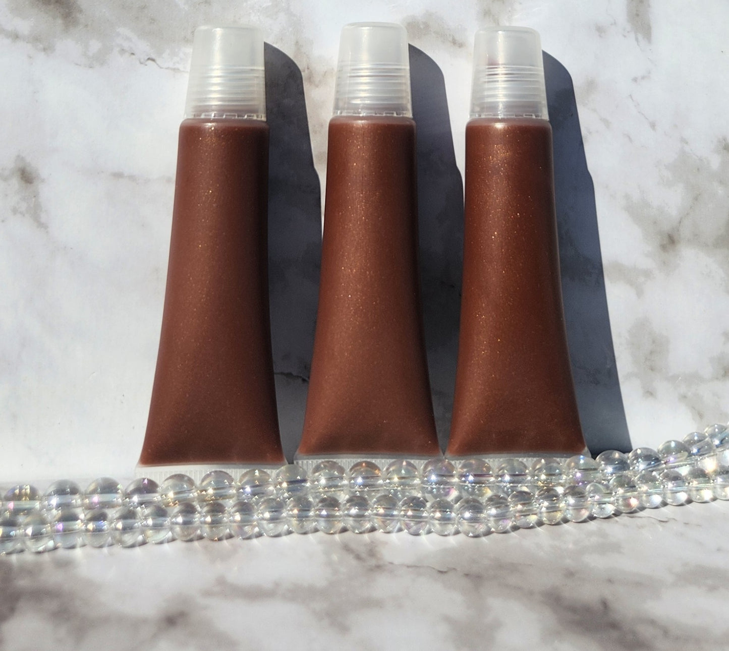 My Help lip gloss (Sheer brown lip gloss)