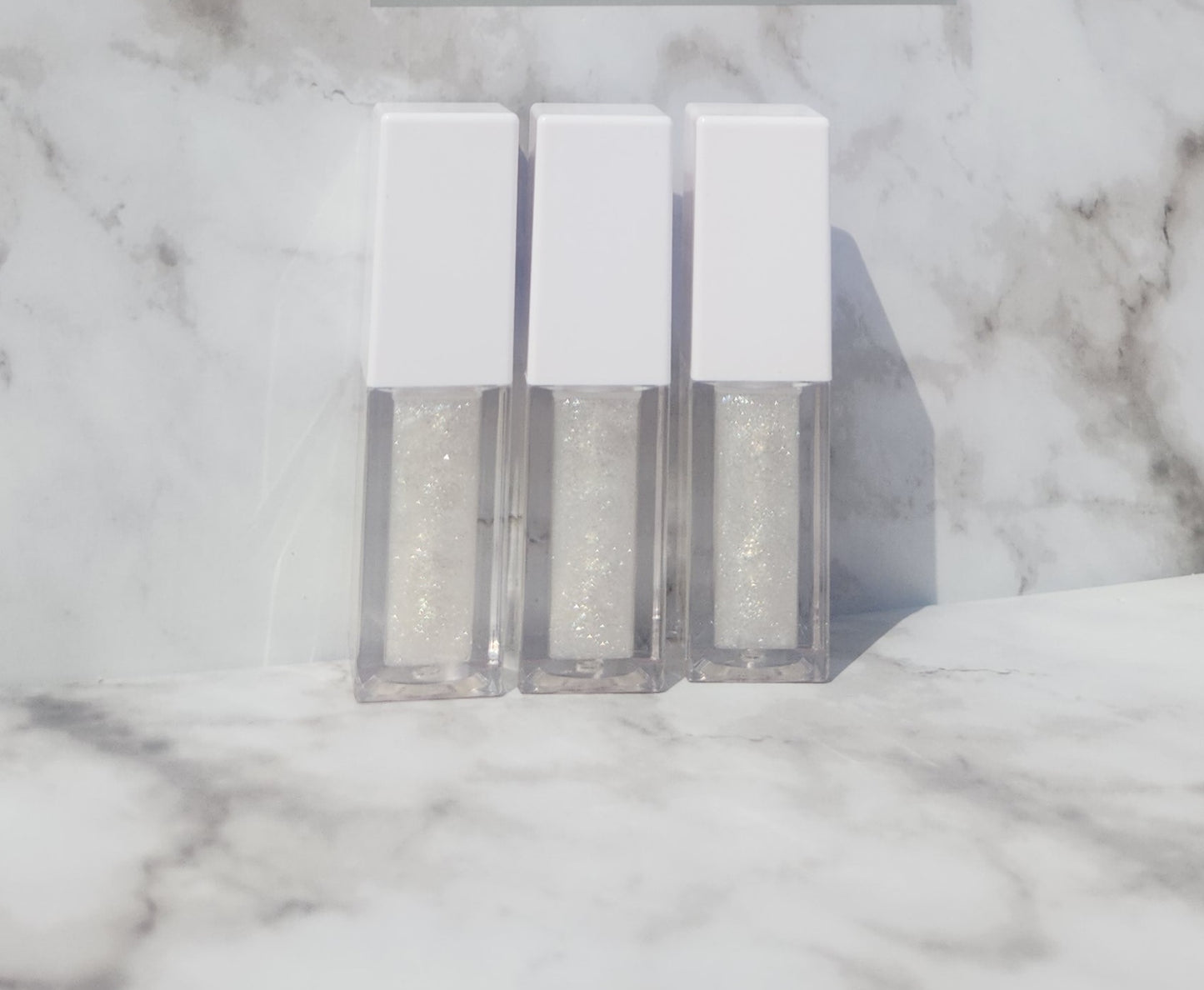 Elohim (sheer shimmering pearl lip gloss) White tube