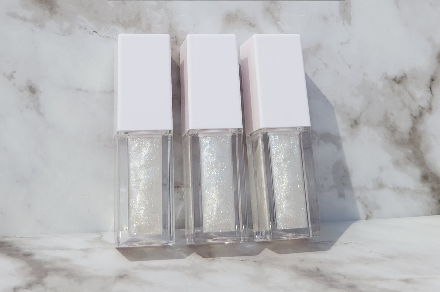 Elohim (sheer shimmering pearl lip gloss) White tube