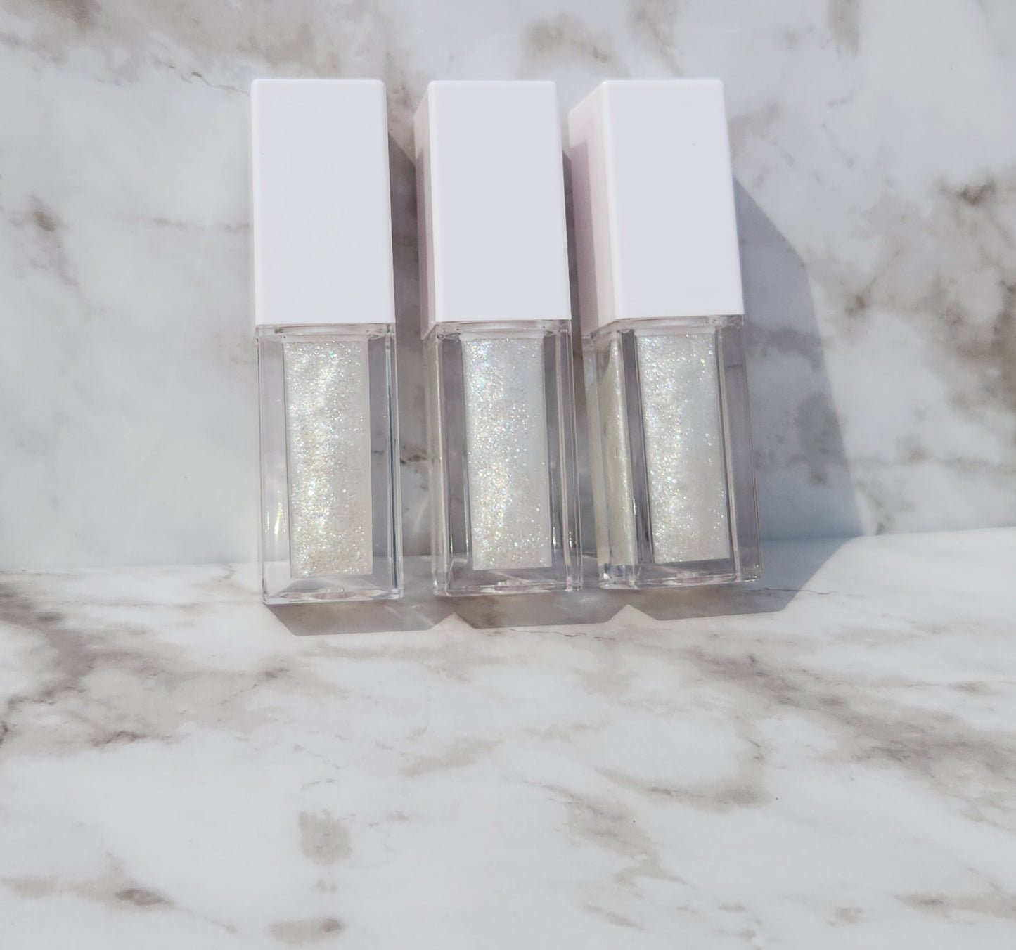 Elohim (sheer shimmering pearl lip gloss) White tube