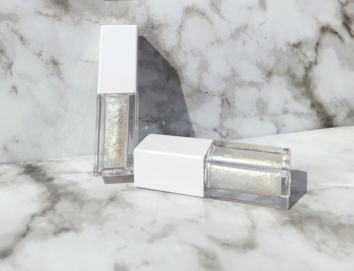 Elohim (sheer shimmering pearl lip gloss) White tube
