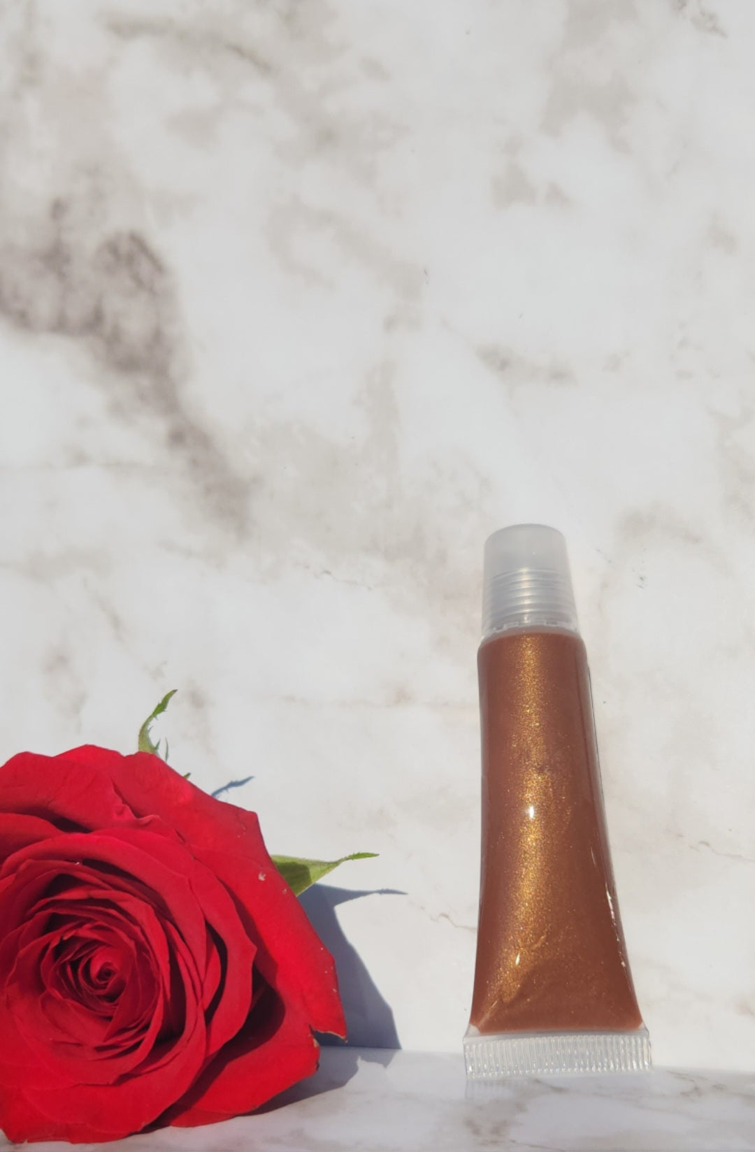 My Help lip gloss (Sheer brown lip gloss)
