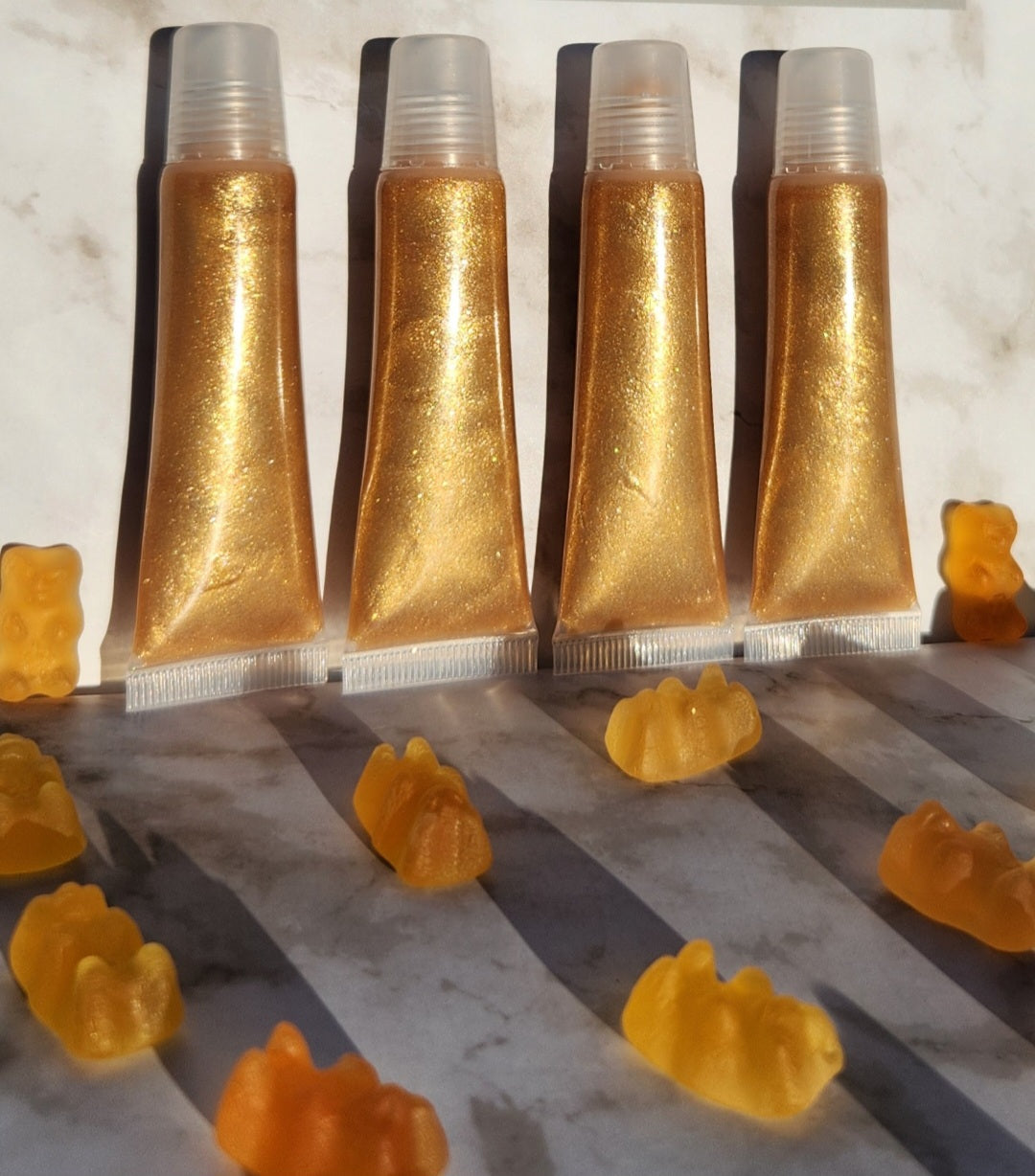 Godly (Gold) shimmering lip gloss