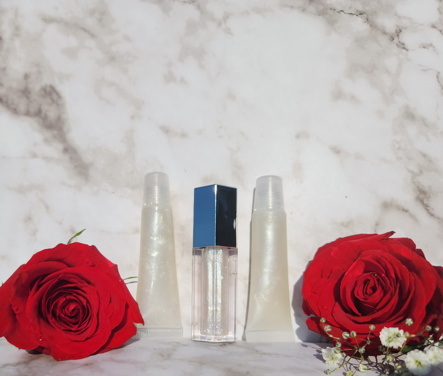 Elohim (sheer shimmering pearl lip gloss)