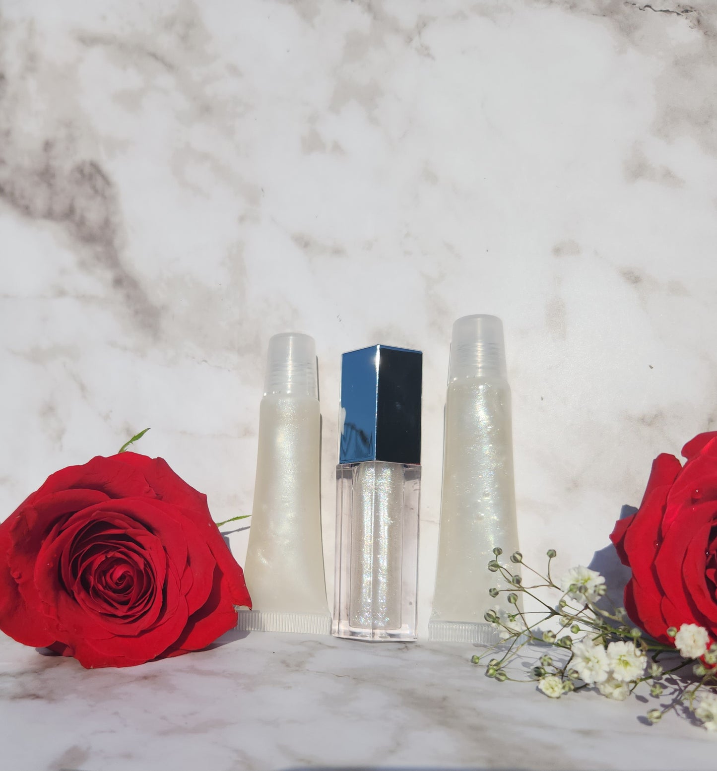 Elohim (sheer shimmering pearl lip gloss)