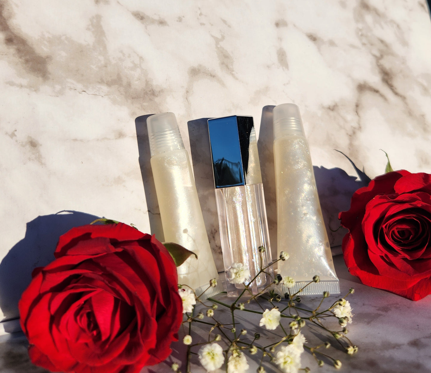 Elohim (sheer shimmering pearl lip gloss)