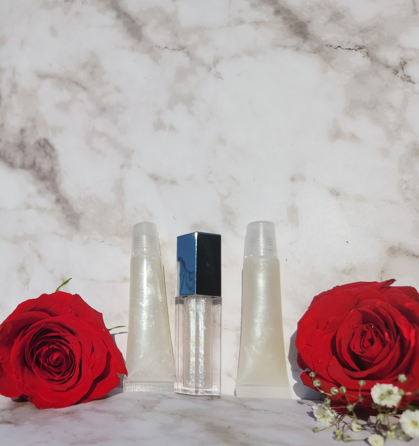 Elohim (sheer shimmering pearl lip gloss)