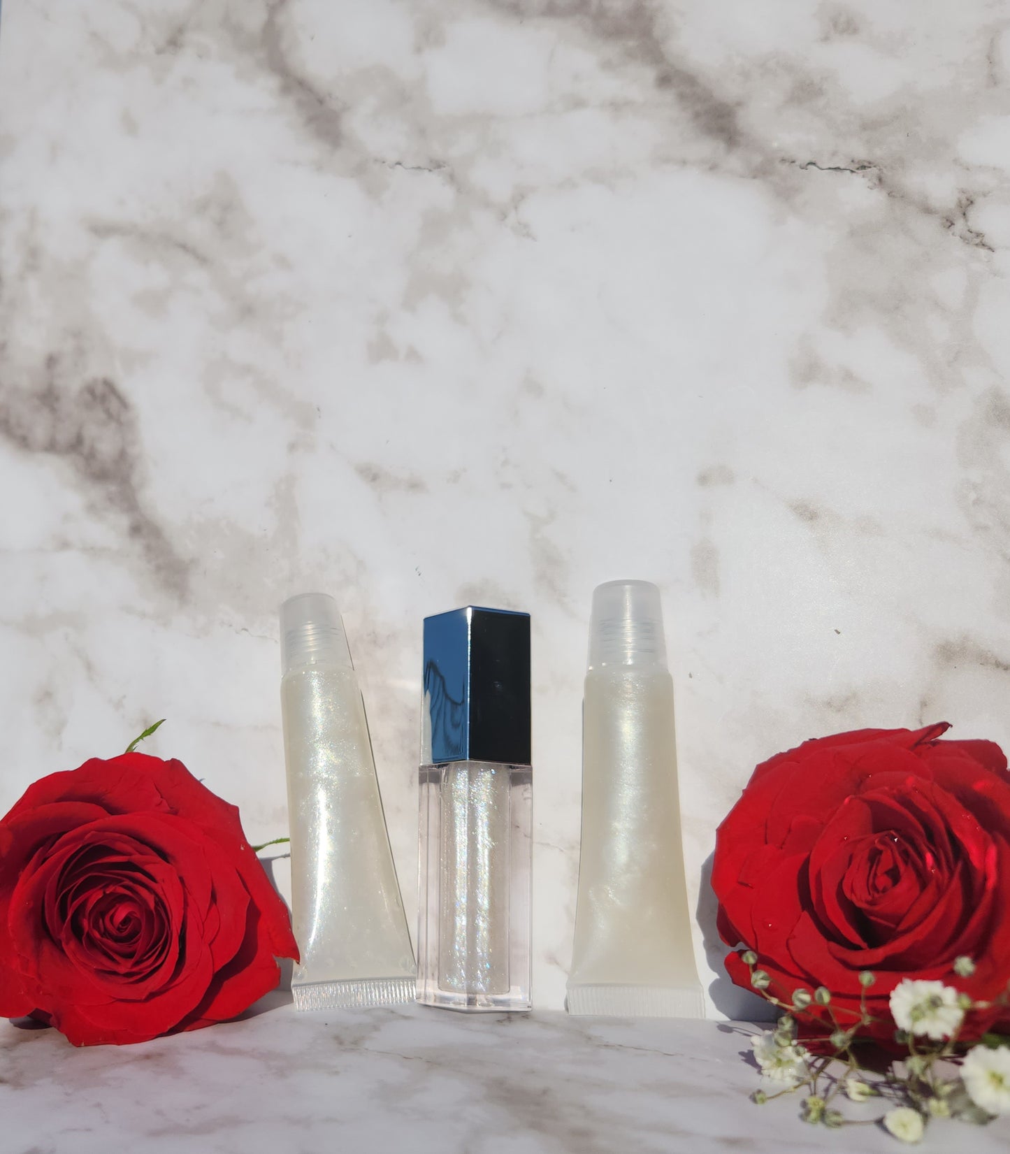 Elohim (sheer shimmering pearl lip gloss)