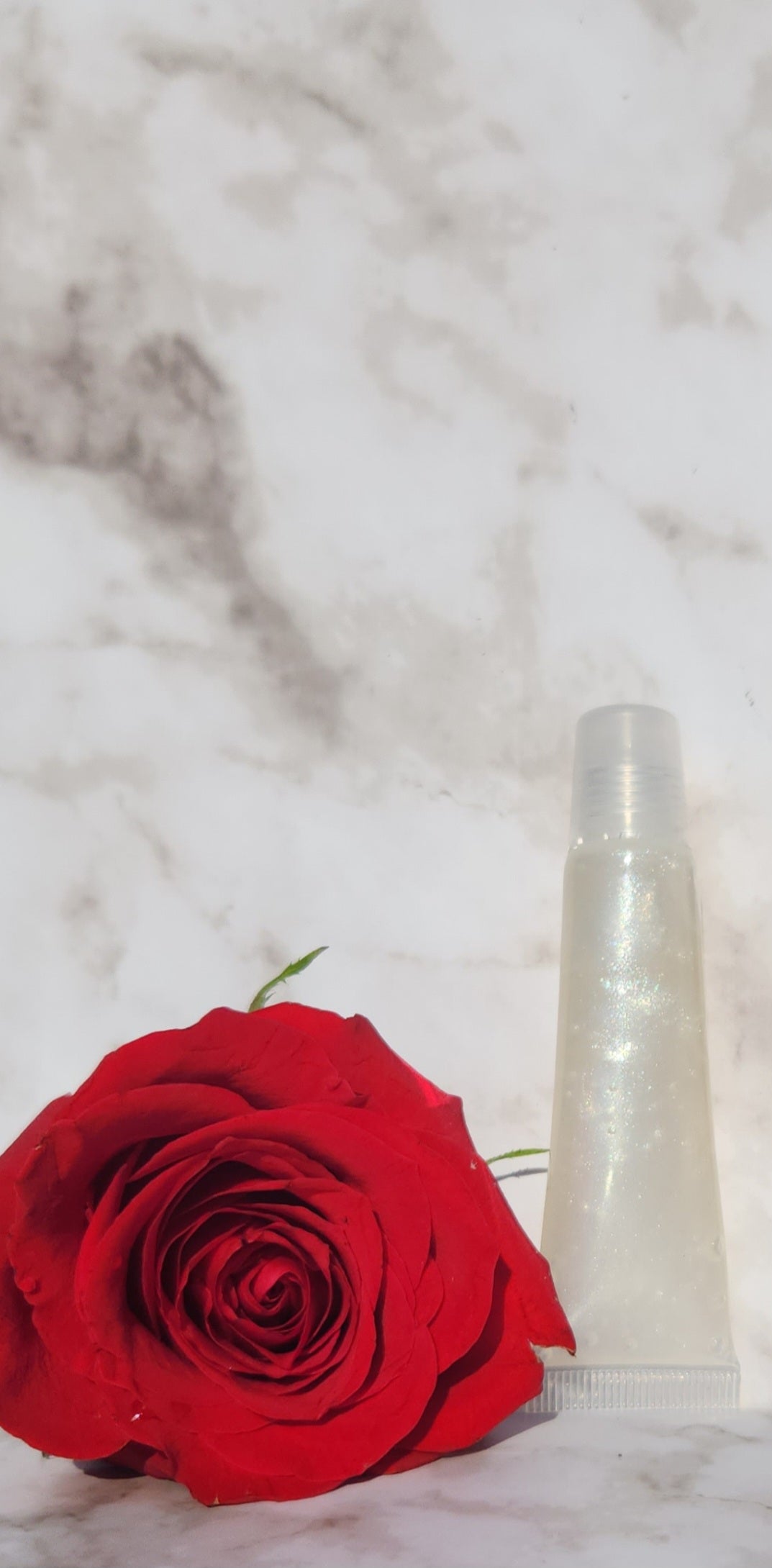 Elohim (sheer shimmering pearl lip gloss)