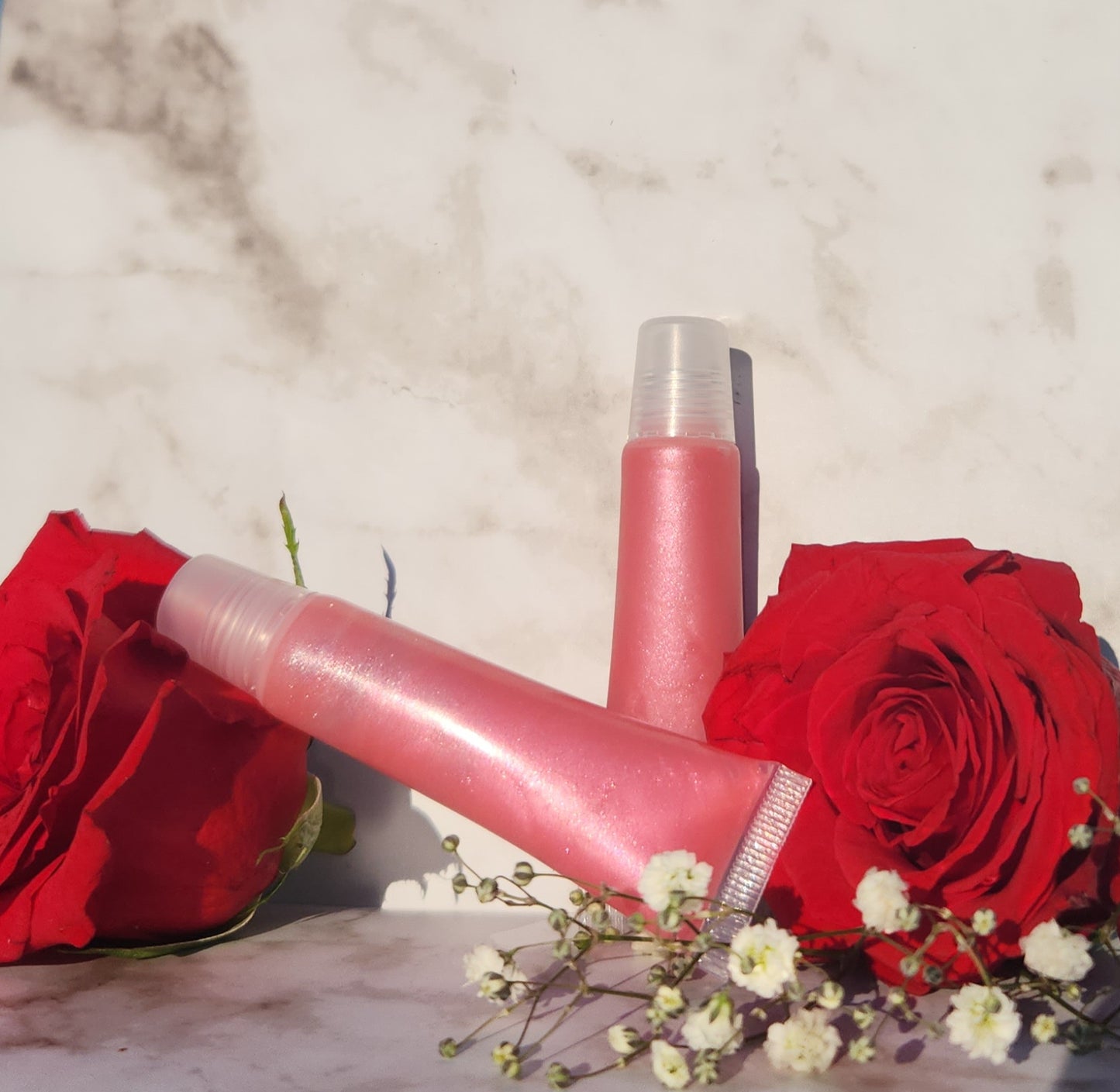 Flight lip gloss ( pretty pink lip gloss)