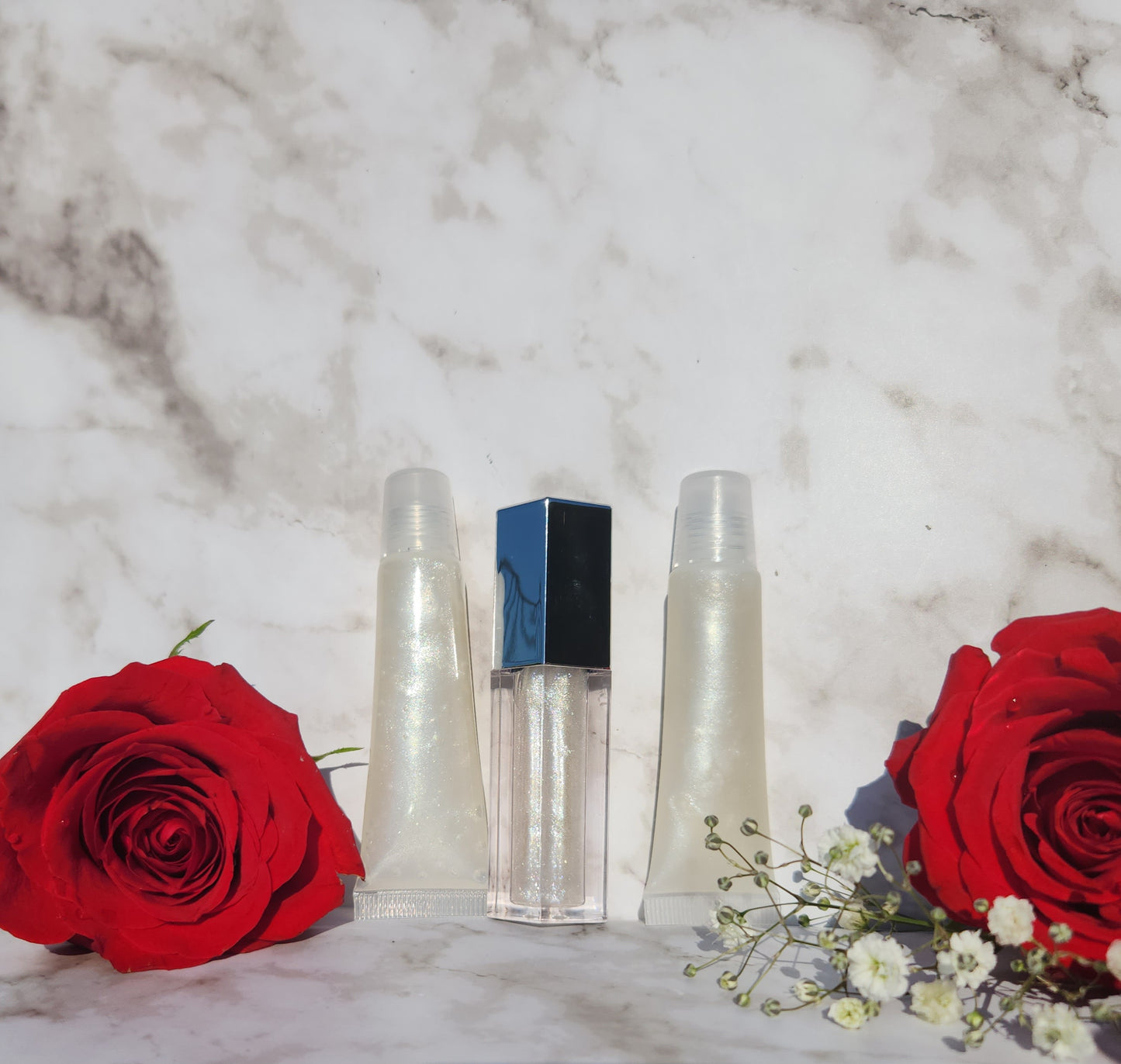 Elohim (sheer shimmering pearl lip gloss)