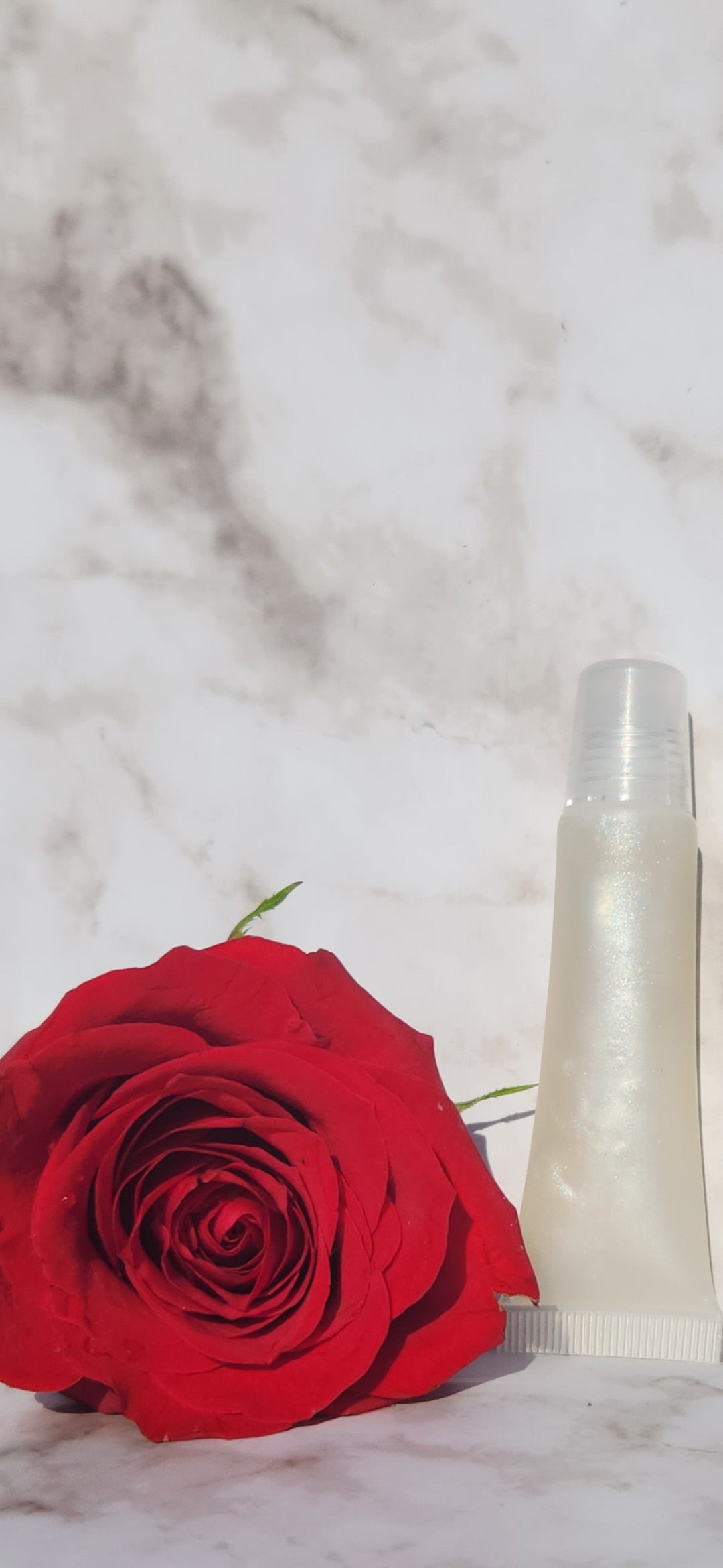 Elohim (sheer shimmering pearl lip gloss)