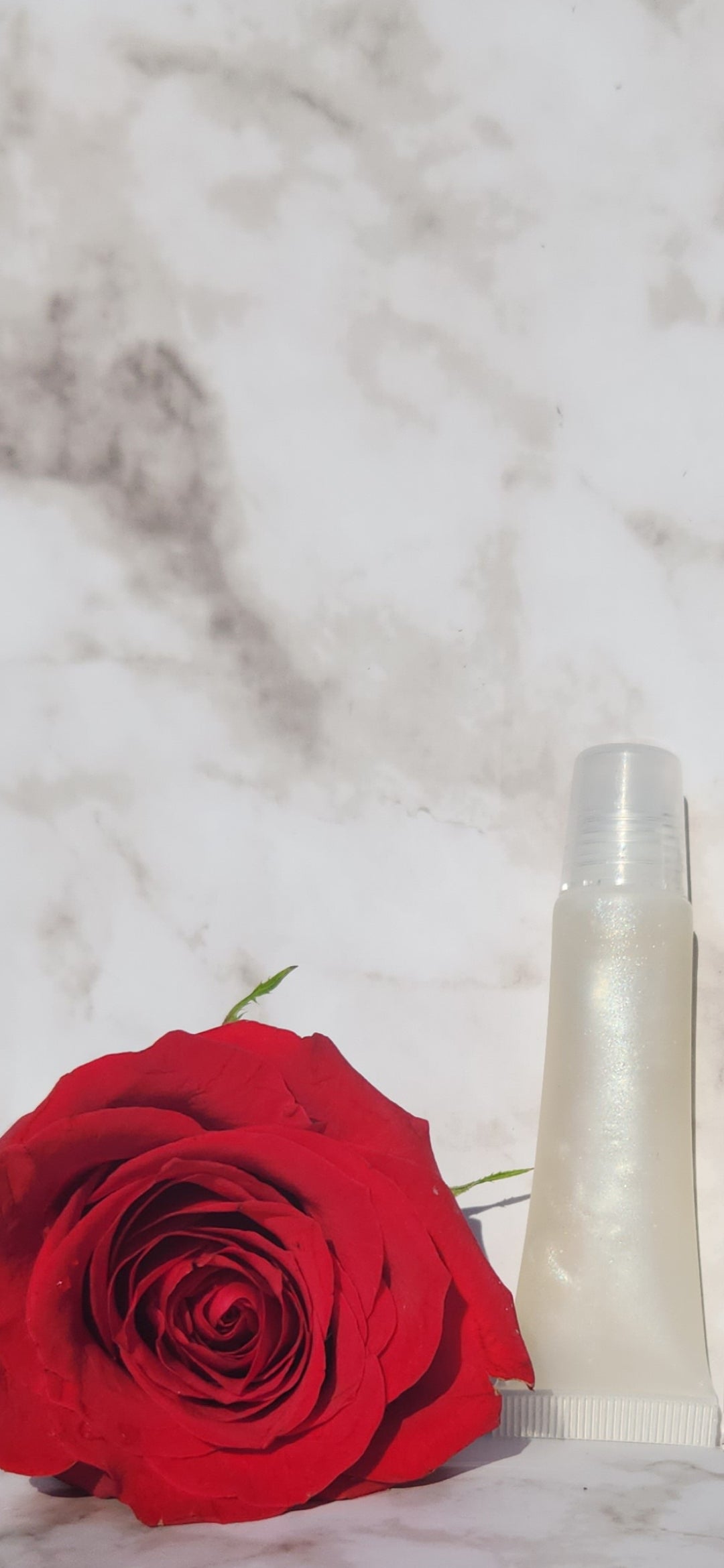 Elohim (sheer shimmering pearl lip gloss)