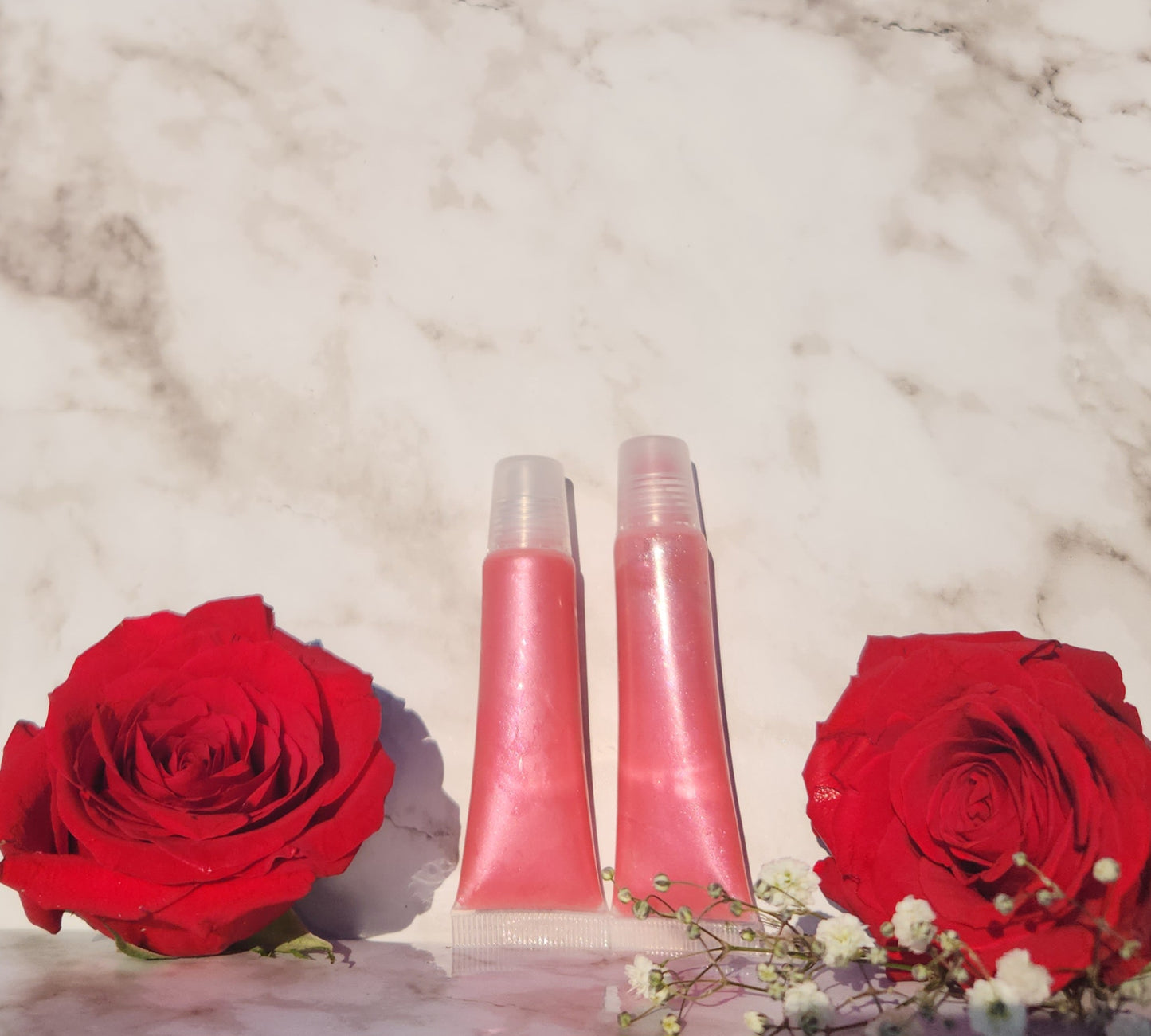 Flight lip gloss ( pretty pink lip gloss)