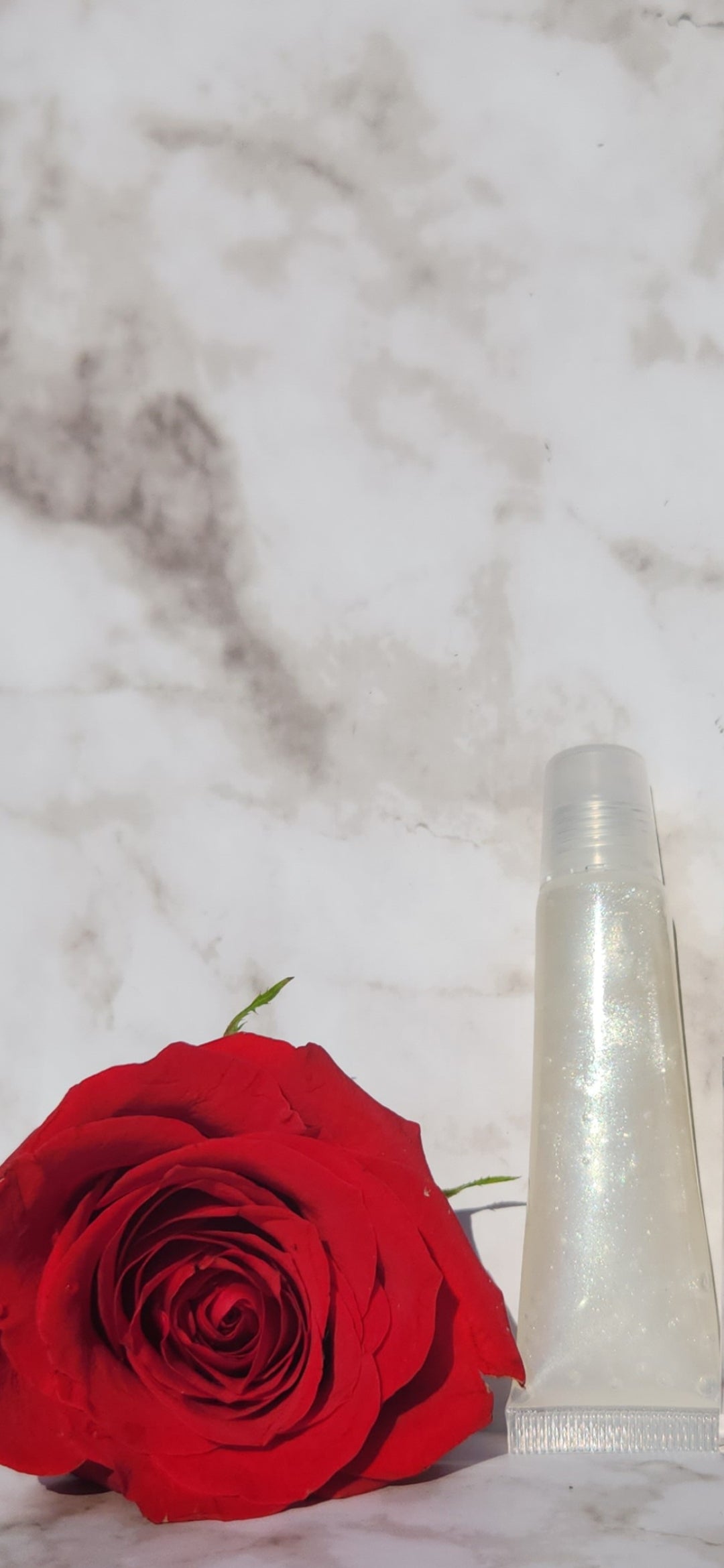 Elohim (sheer shimmering pearl lip gloss)
