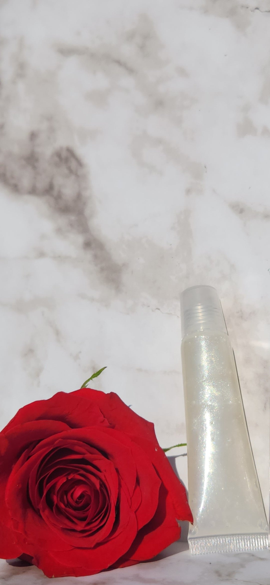 Elohim (sheer shimmering pearl lip gloss)