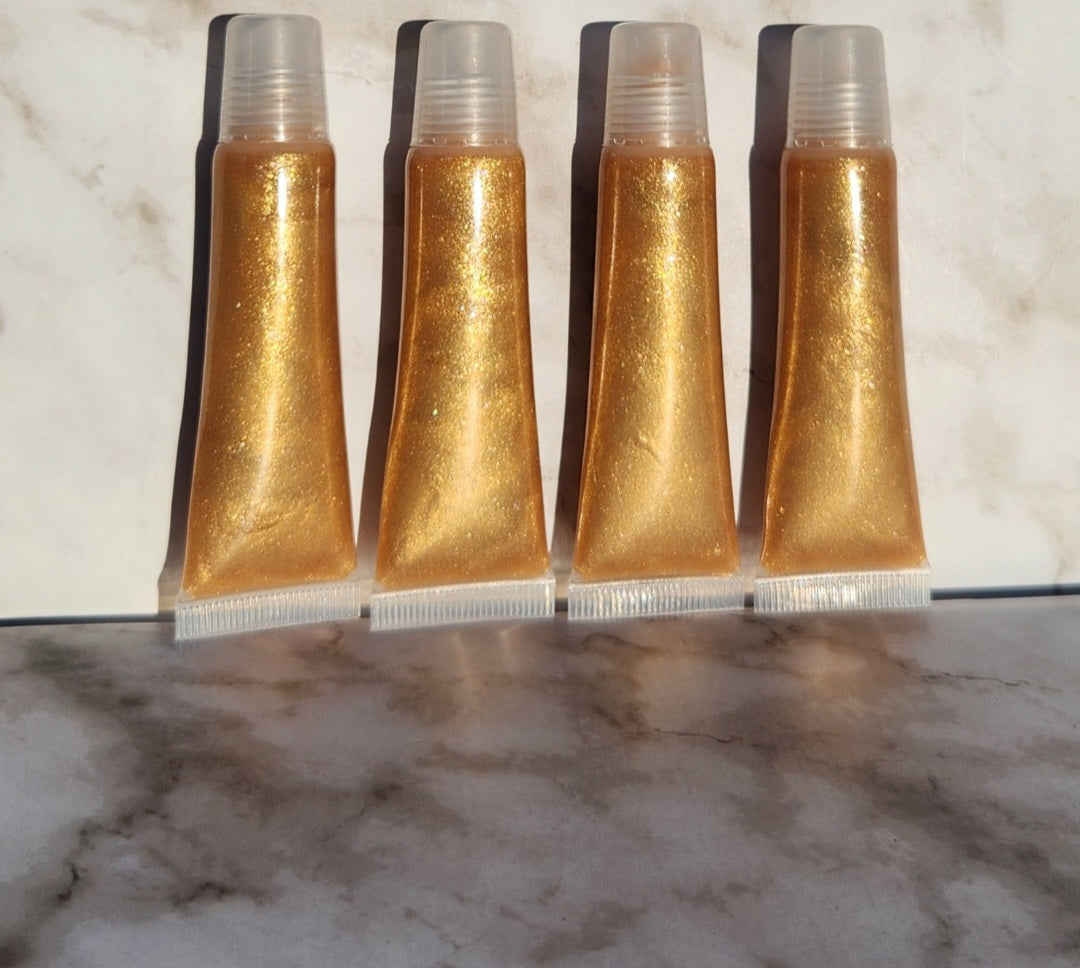 Godly (Gold) shimmering lip gloss